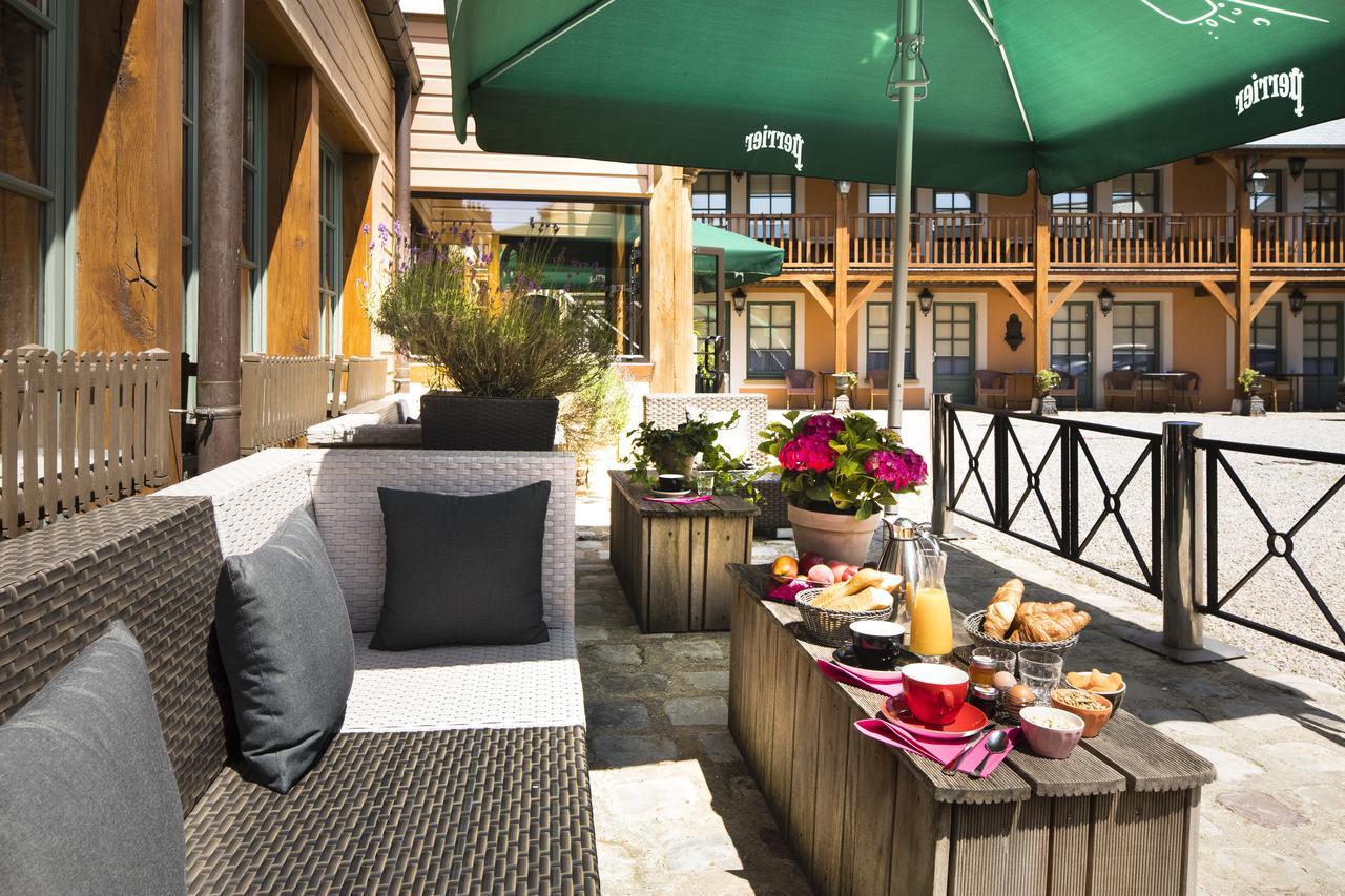 Hotel Et Spa Le Lion D'Or Pont-Évêque Exterior foto